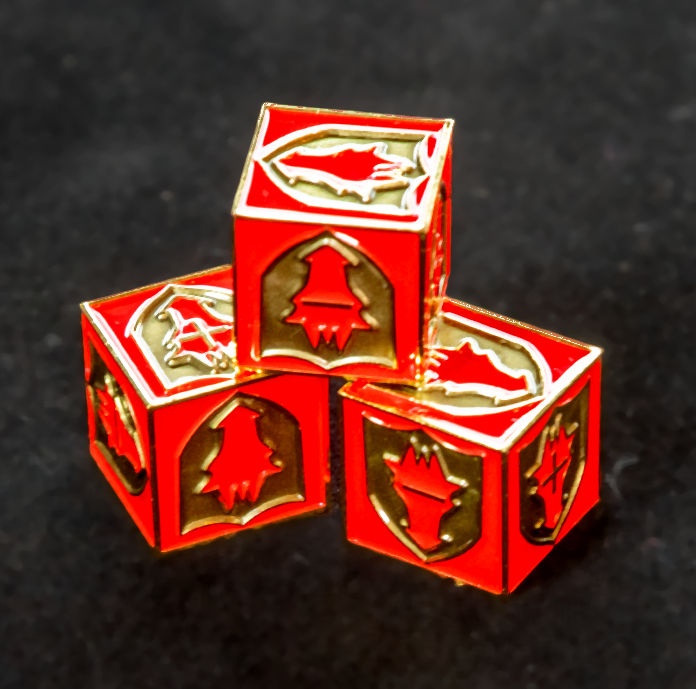Three red enamel old metal Fate dice with a dragon's head crest.