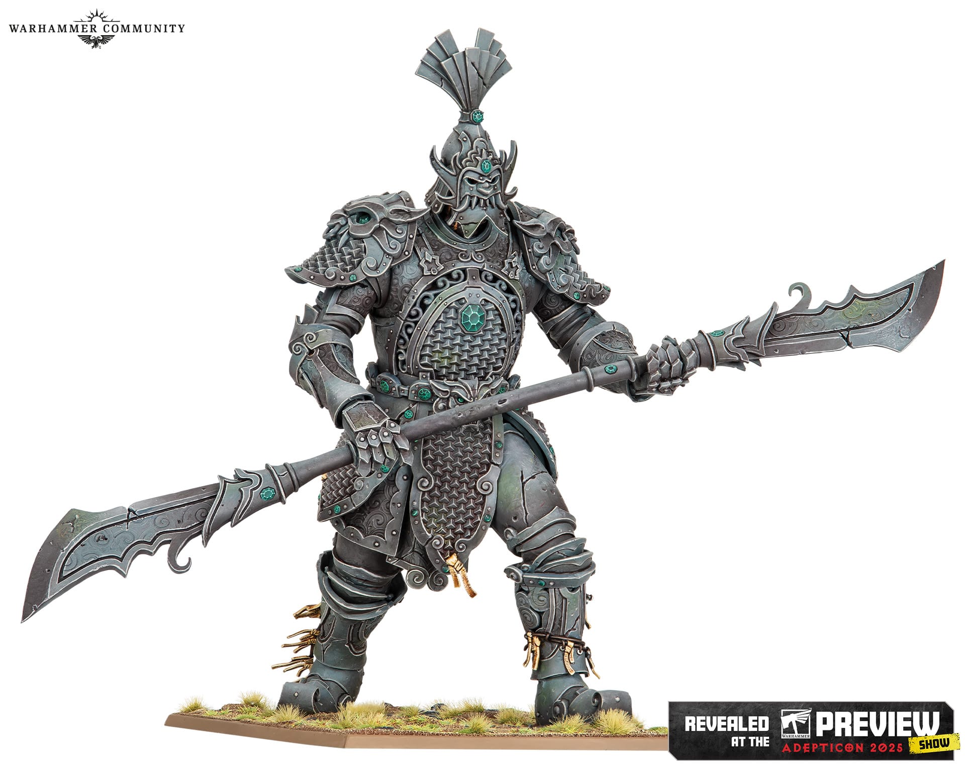A photo of a Cathayan Sentinel miniature, a giant grey stone warrior with accents of green jade