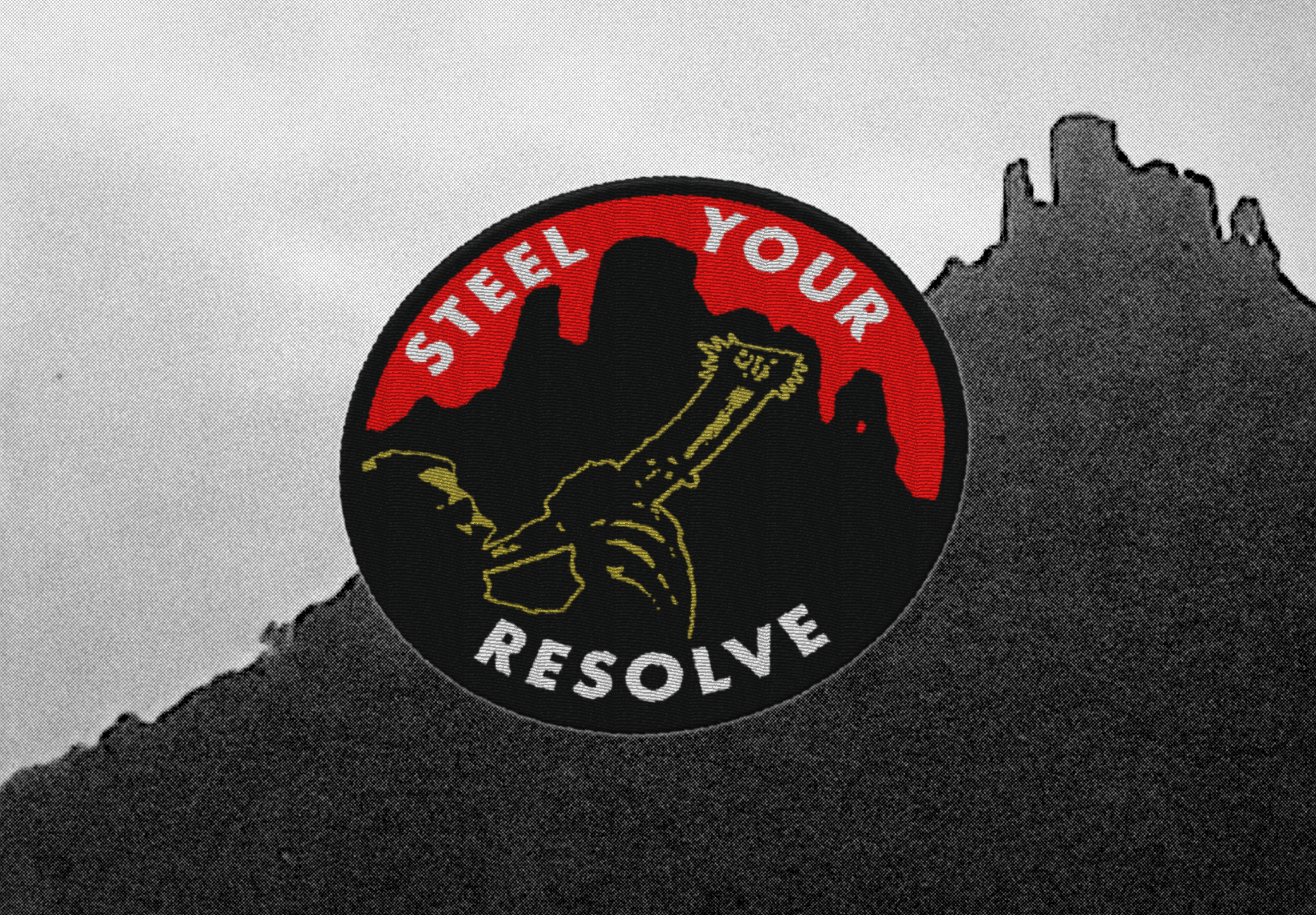 mock up of embroidered patch in front of a grainy b+w image of a silhouetted fort. The patch is circular, with red, black, gold and white colours. It depicts someone blowing an elaborate horn in front of the silhouette of a fort. The words read: STEEL YOUR RESOLVE
