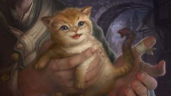 A kitten with an alien tail sits in the hands of someone with a bandaged thumb.