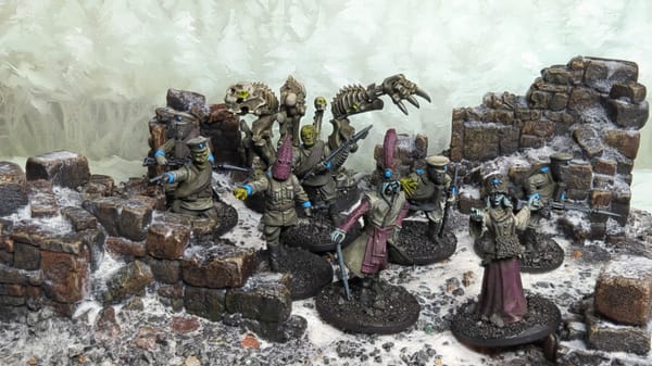 A photo of miniature figures of undead Russian Civil War soldiers on snowy ruins.
