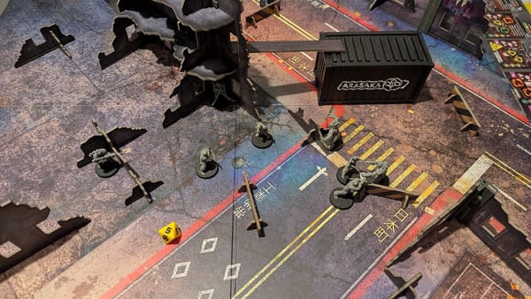 A photo of a Cyberpunk: Combat Zone game in progress.