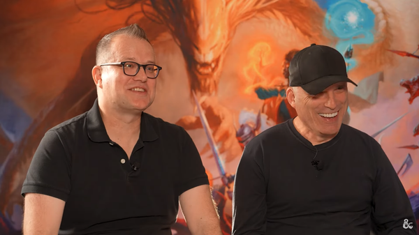 (L to R) Jeremy Crawford and Chris Perkins on a Dungeons & Dragons marketing video, background from PHB cover.